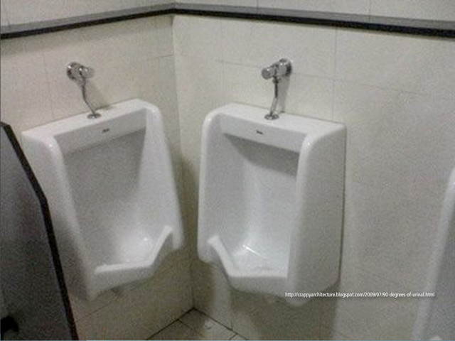 http://crappyarchitecture.blogspot.com/2009/07/90-degrees-of-urinal.html
