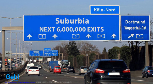 © Mitifo | Dreamstime.com - Cologne-Ring Highway Sign Photo EDITED BY INSERTION OF TEXT SUBURBIA NEXT 6,000,000 EXITS
